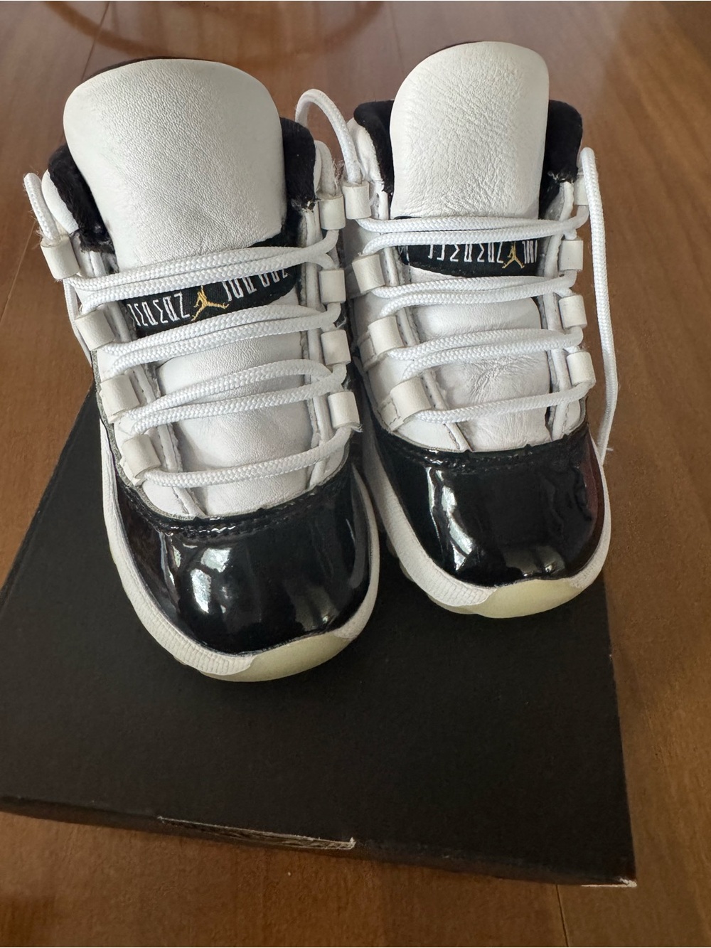 Jordan 11 Retro Black and White Patent Leather Basketball Sneakers